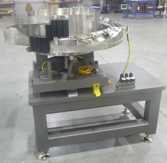 Vibratory feeder on table